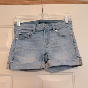American Eagle midi ne(x)t level stretch denim jean short. Size 0